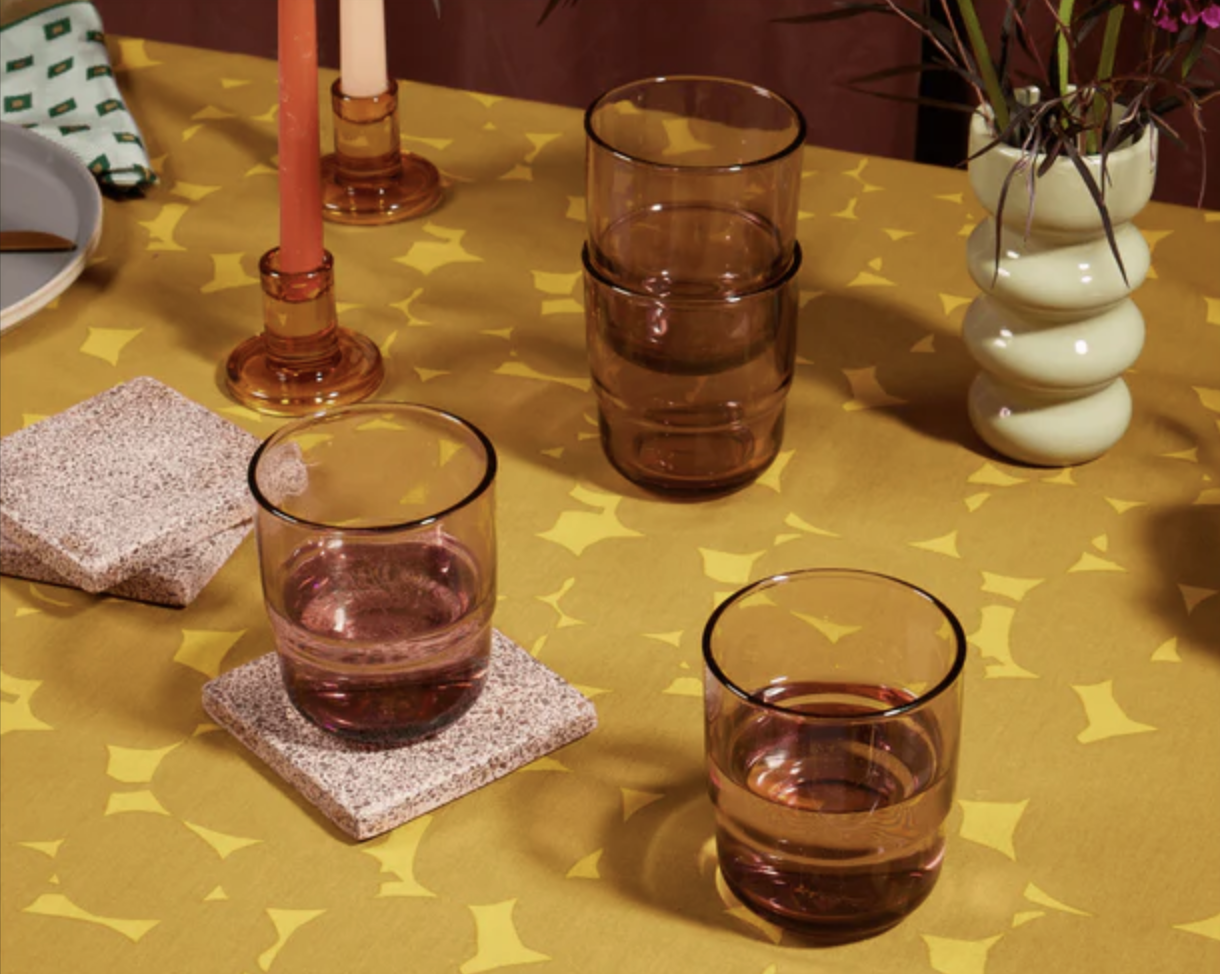 four glasses on a funky table