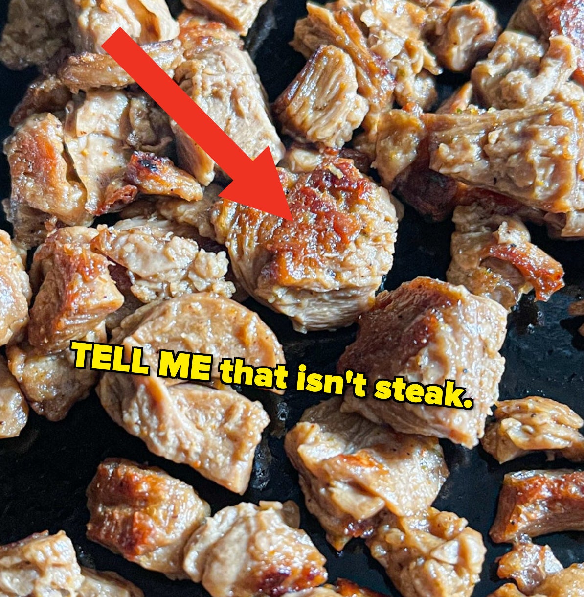 arrow pointing to the sear, close up with text: tell me that isn&#x27;t steak