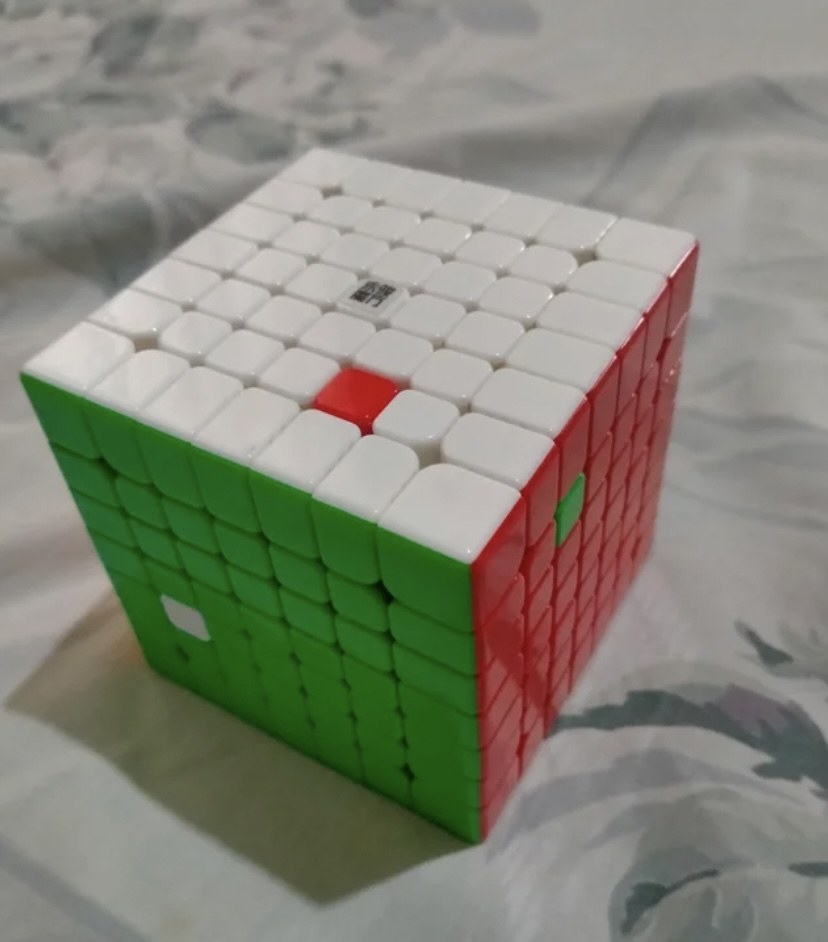 cube with one wrong color tile on each side