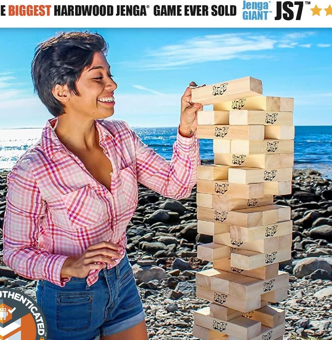 a person playing the game with a tower that is taller than them