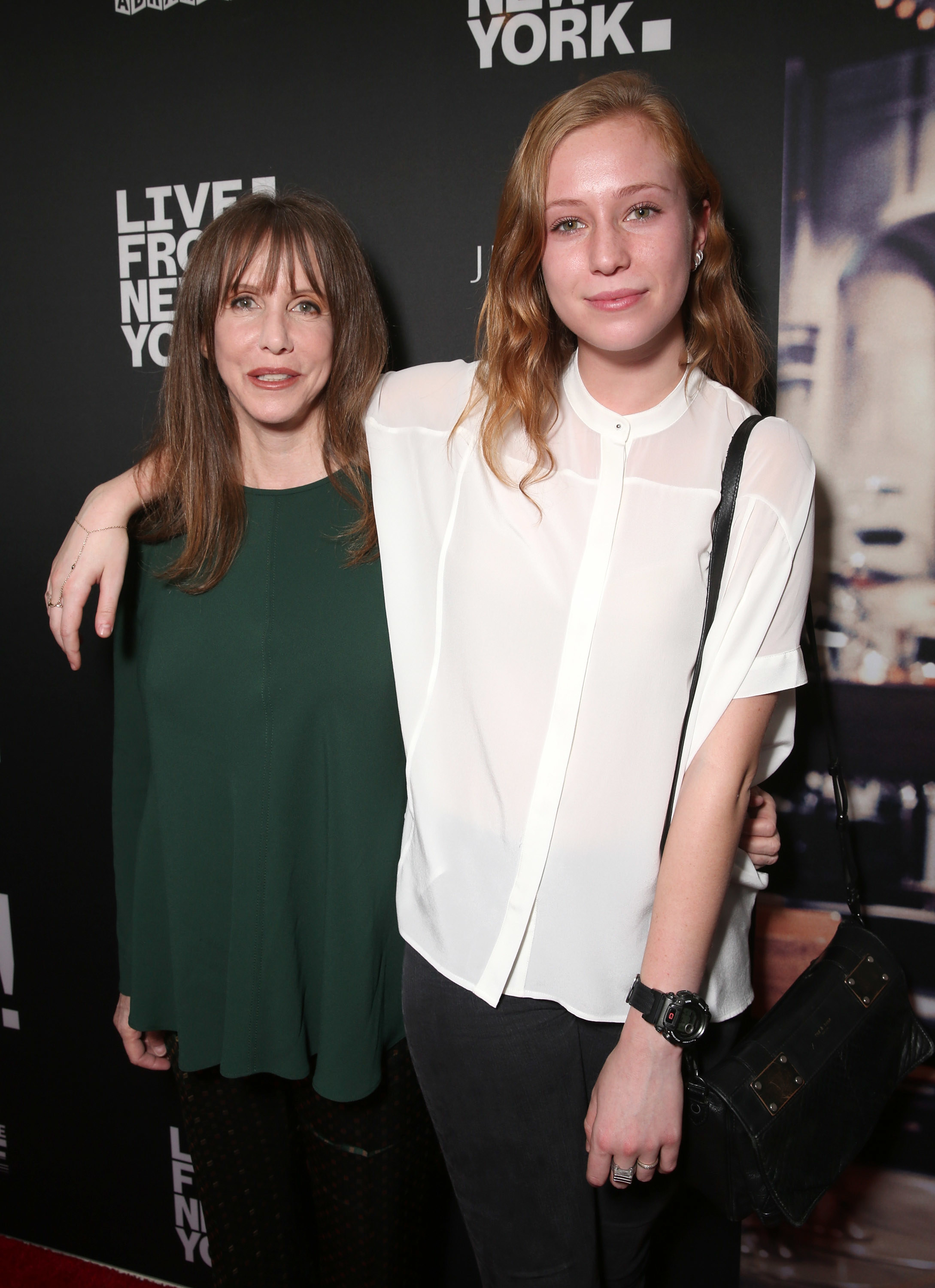 Hannah with her arm around Laraine on the red carpet