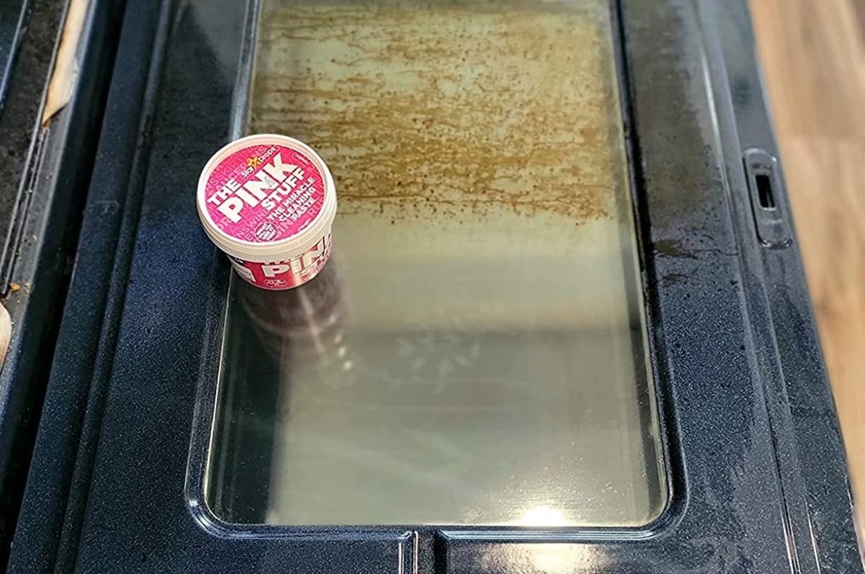 A reviewer's oven before and after using the pink stuff 