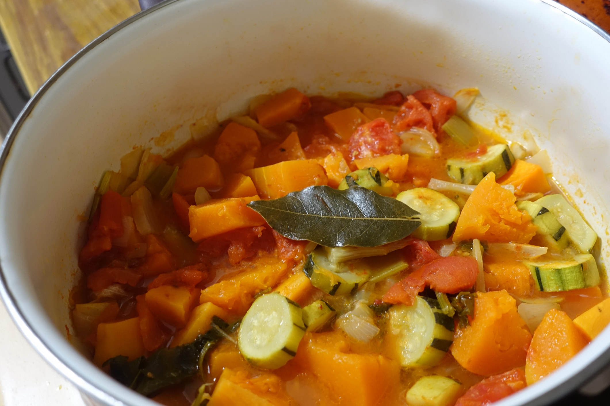 Cooked vegetable stew with bay leaf