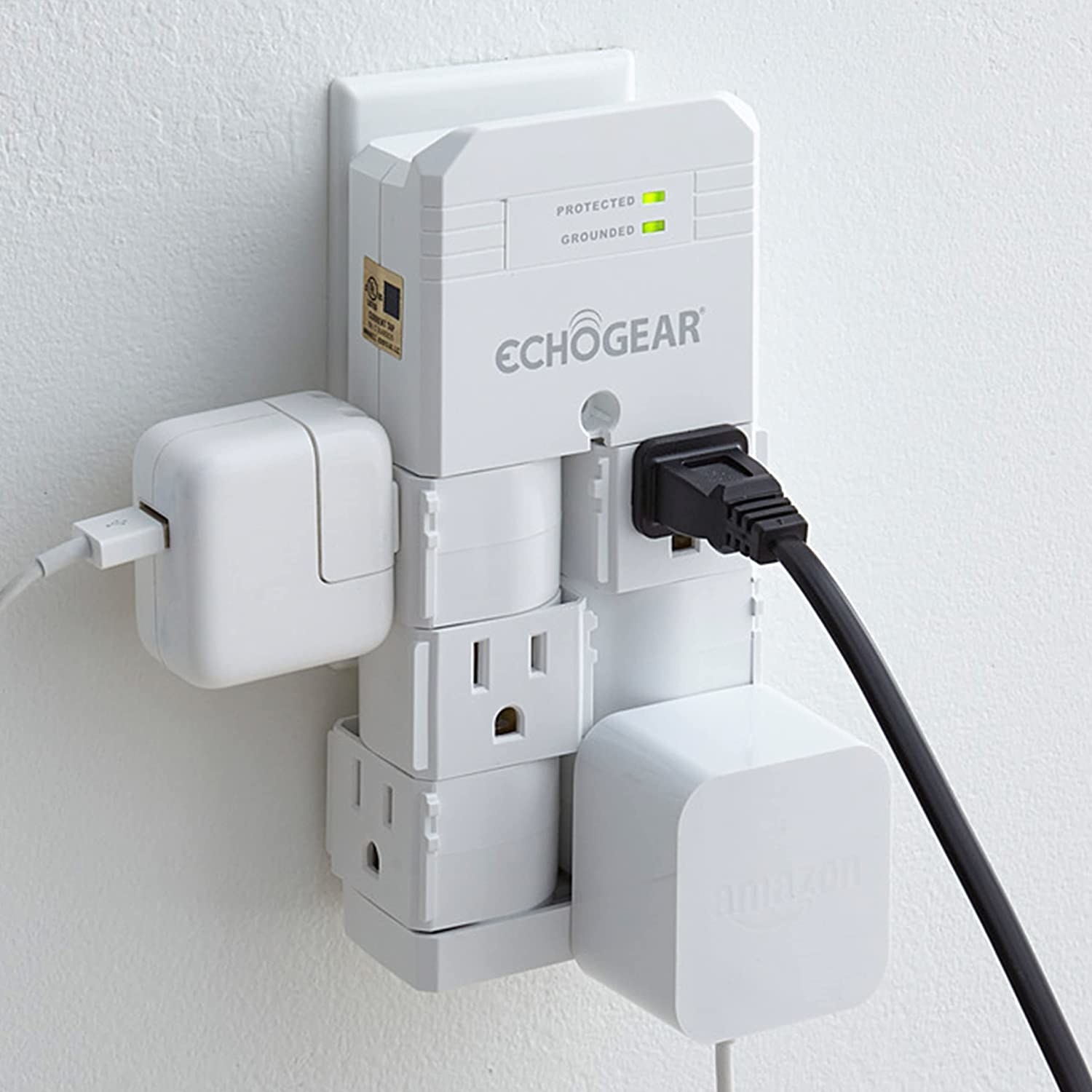 The surge protector with three cords plugged in