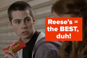 dylan obrien holds up a reeses