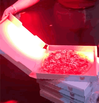 Opening a pizza box