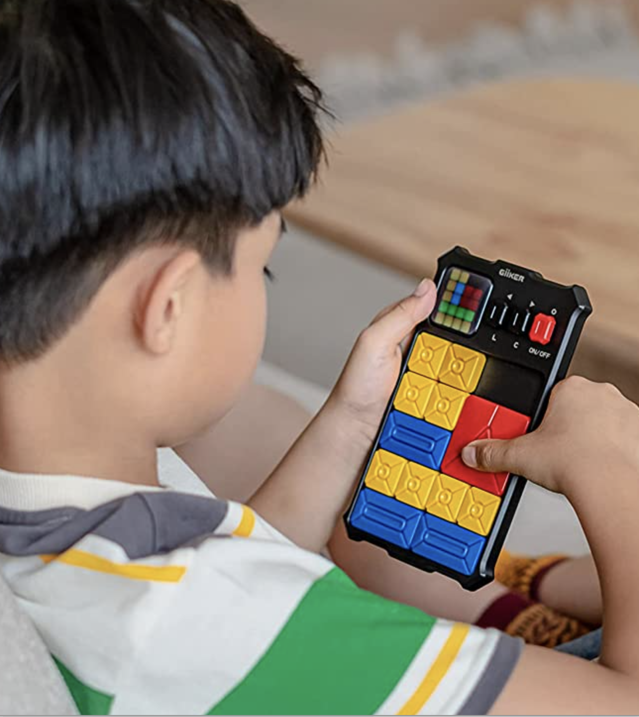 A child playing with the sliding puzzle game