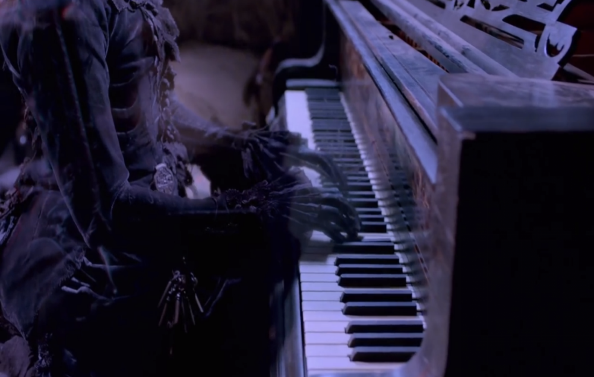 skeleton hands playing piano