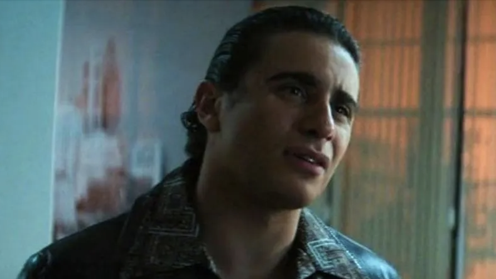 Close-up of Jake with slicked-back hair