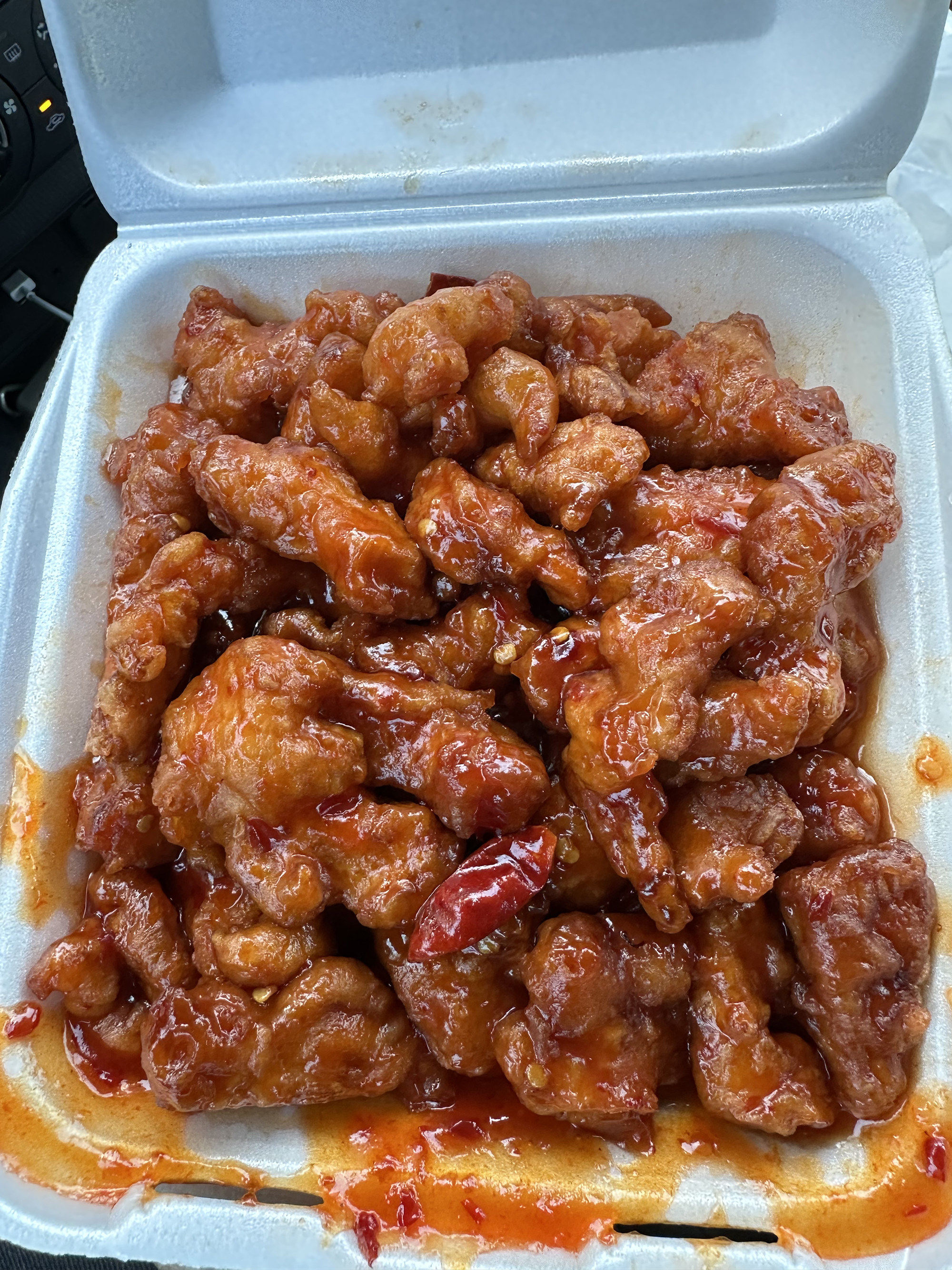 A plate of orange chicken