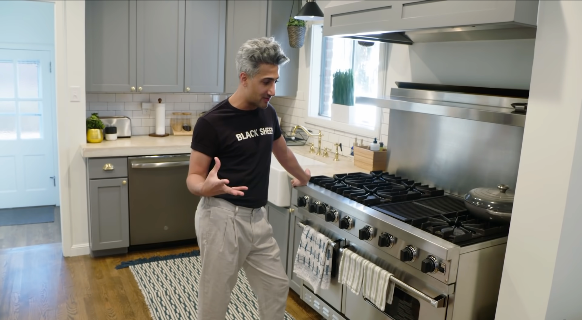 Tan in his kitchen