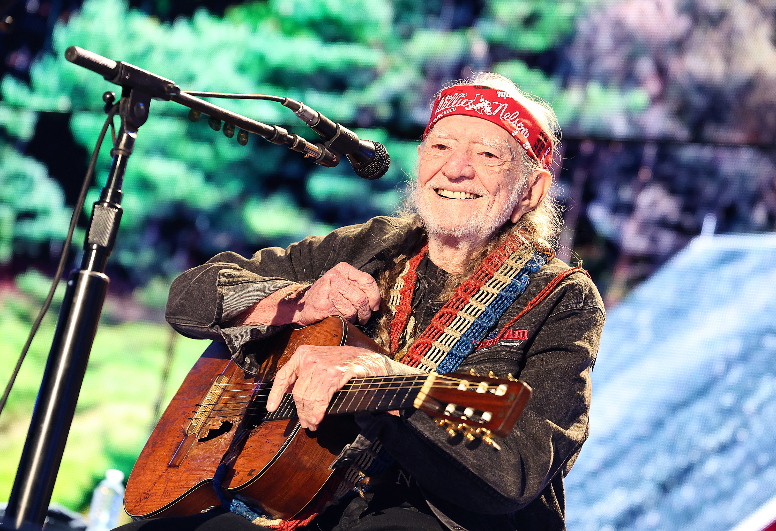 willie nelson with a guitar