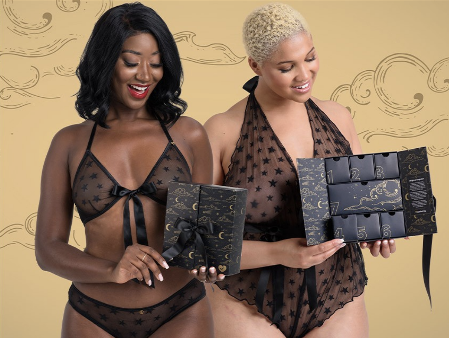 Models holding black lingerie advent calendars