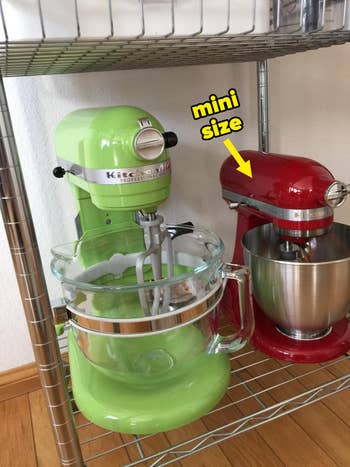 a reviewer's large green mixer next to their mini red mixer