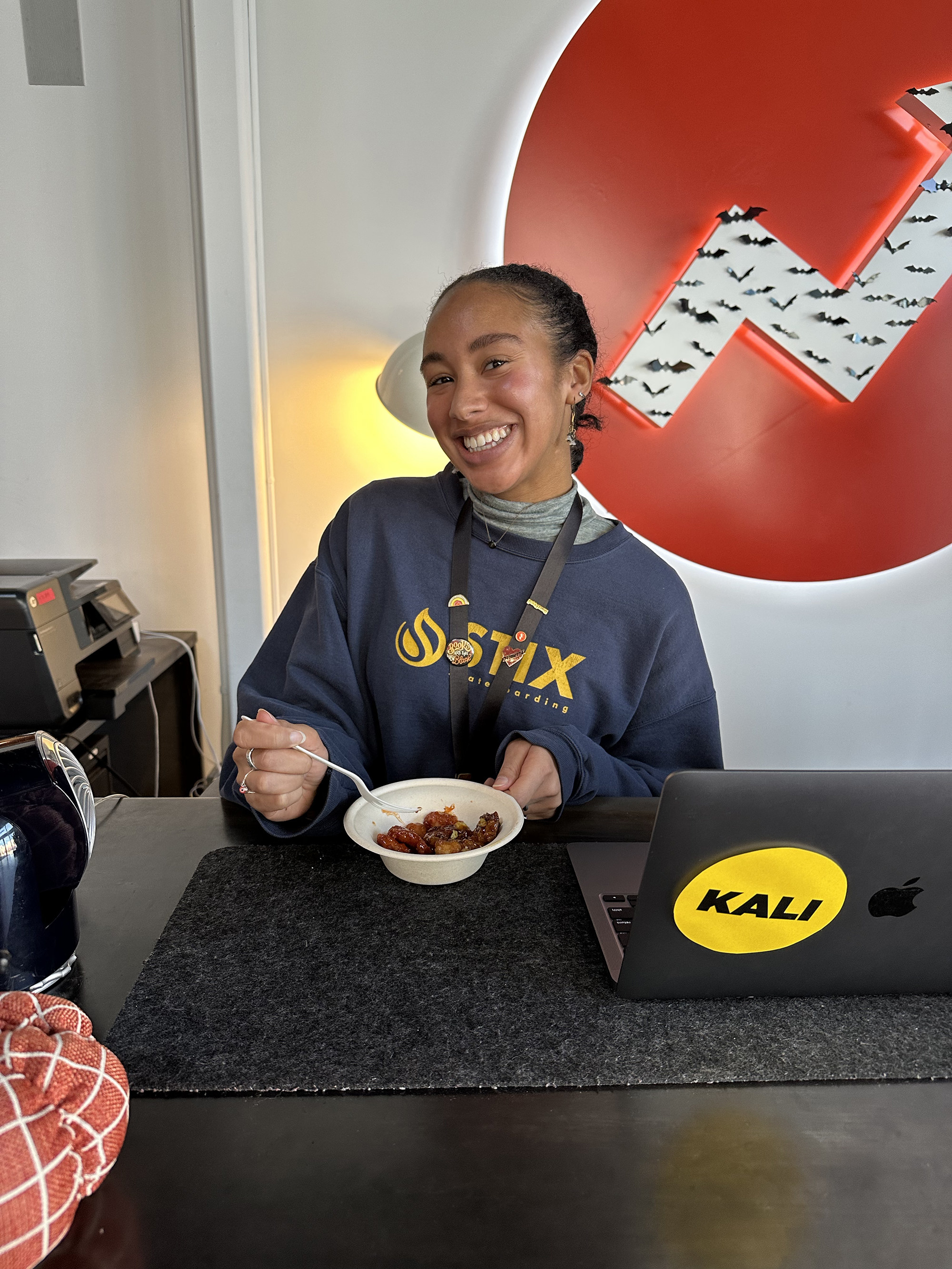 A woman eating chicken