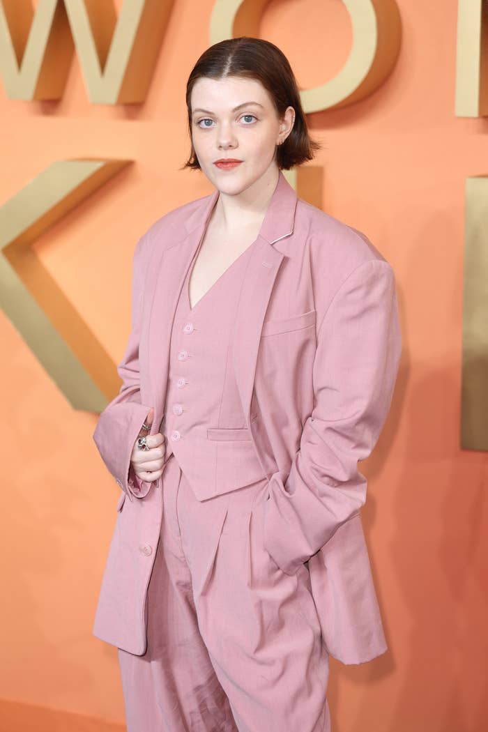 Georgie rocking a relaxed fit suit at a red carpet event