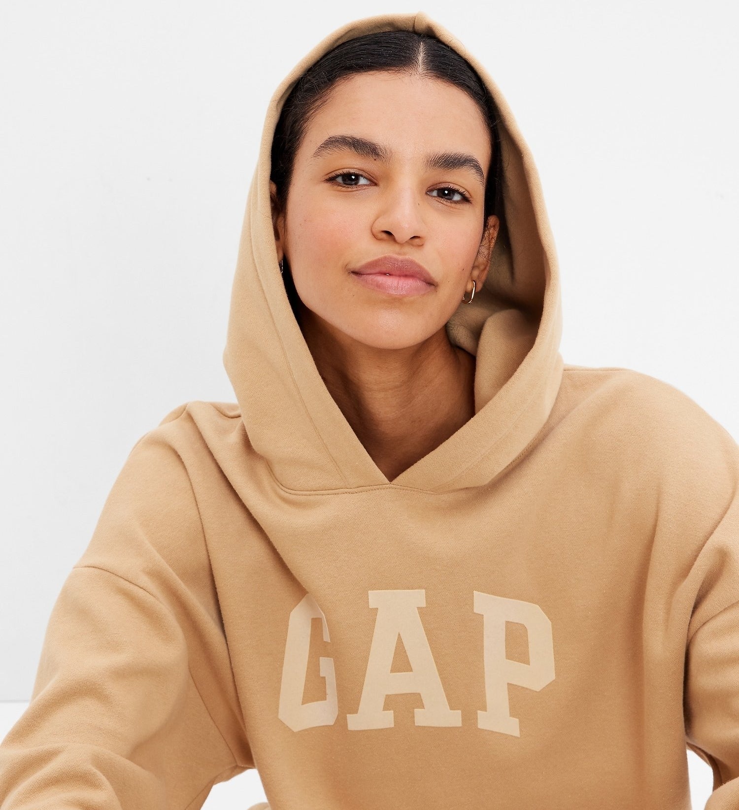 a person wearing a gap hoodie