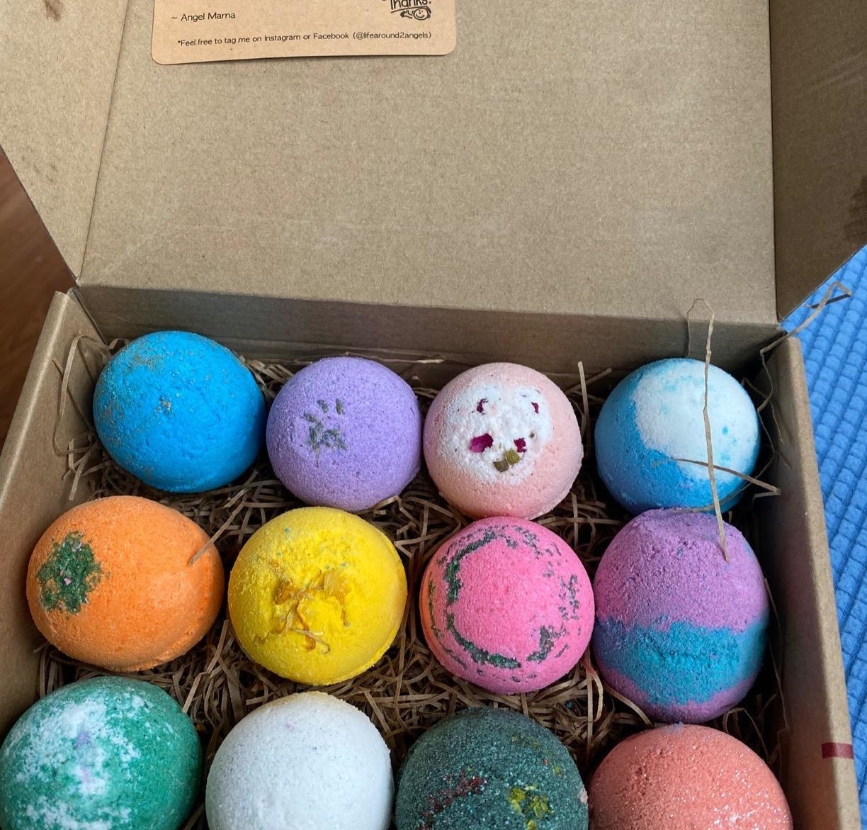 12 bath bombs in different colors and scents