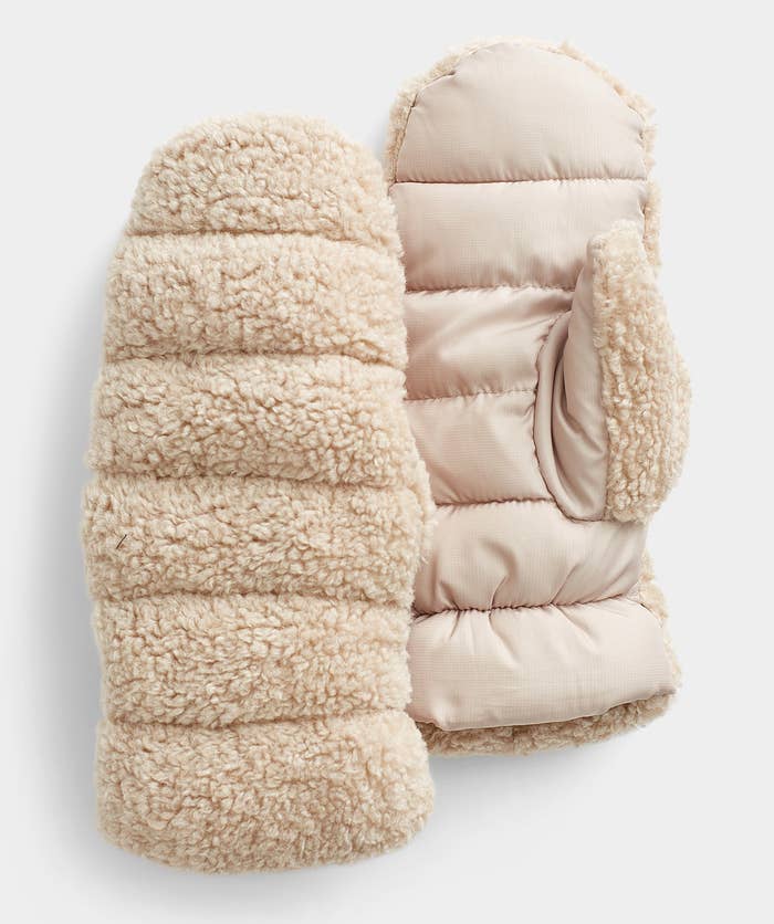 a pair of quilted sherpa mittens