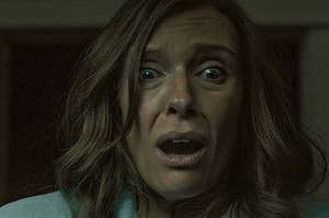 toni collette in "hereditary" with eyes wide, mouth wide, brows raised