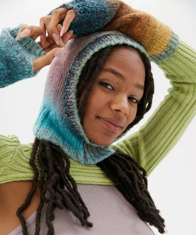 a person wearing a knit balaclava