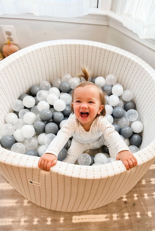 a child in a ball pit