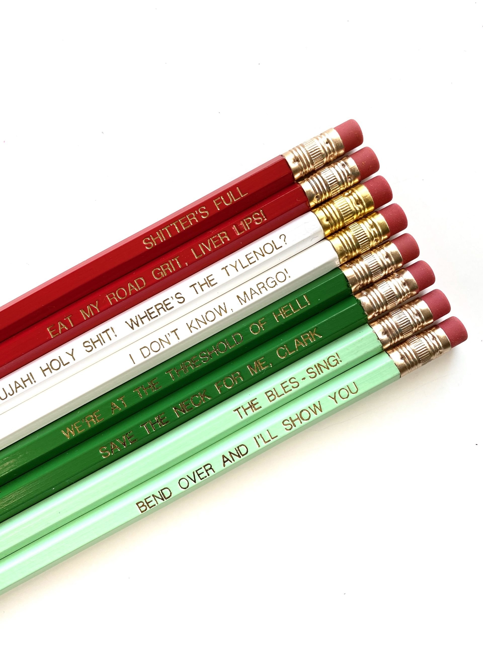 Red, white, and green pencils with quotes from Christmas Vacation