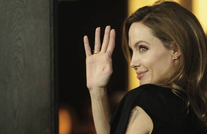 Angelina waving