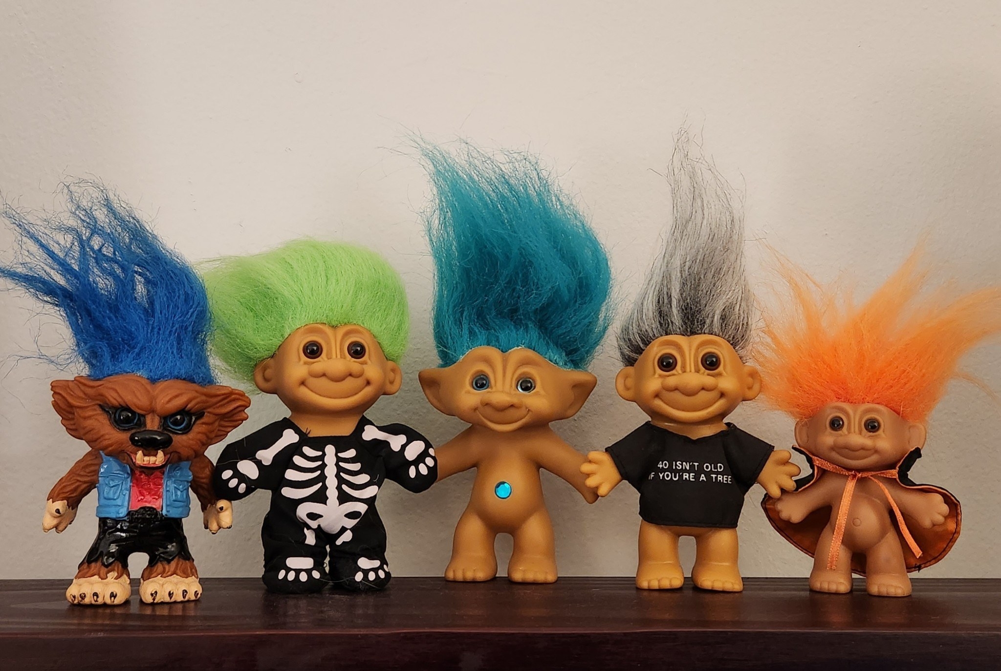 a group of troll dolls from the &#x27;90s