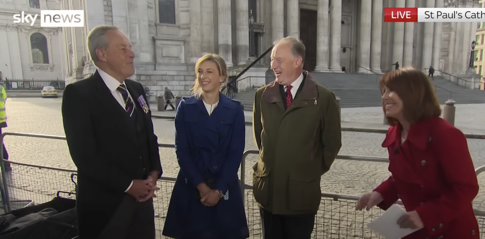Richard standing with three other people on Sky News