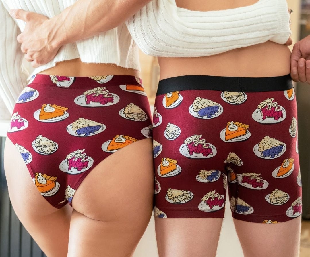 two models wearing matching pairs of underwear with a pie print