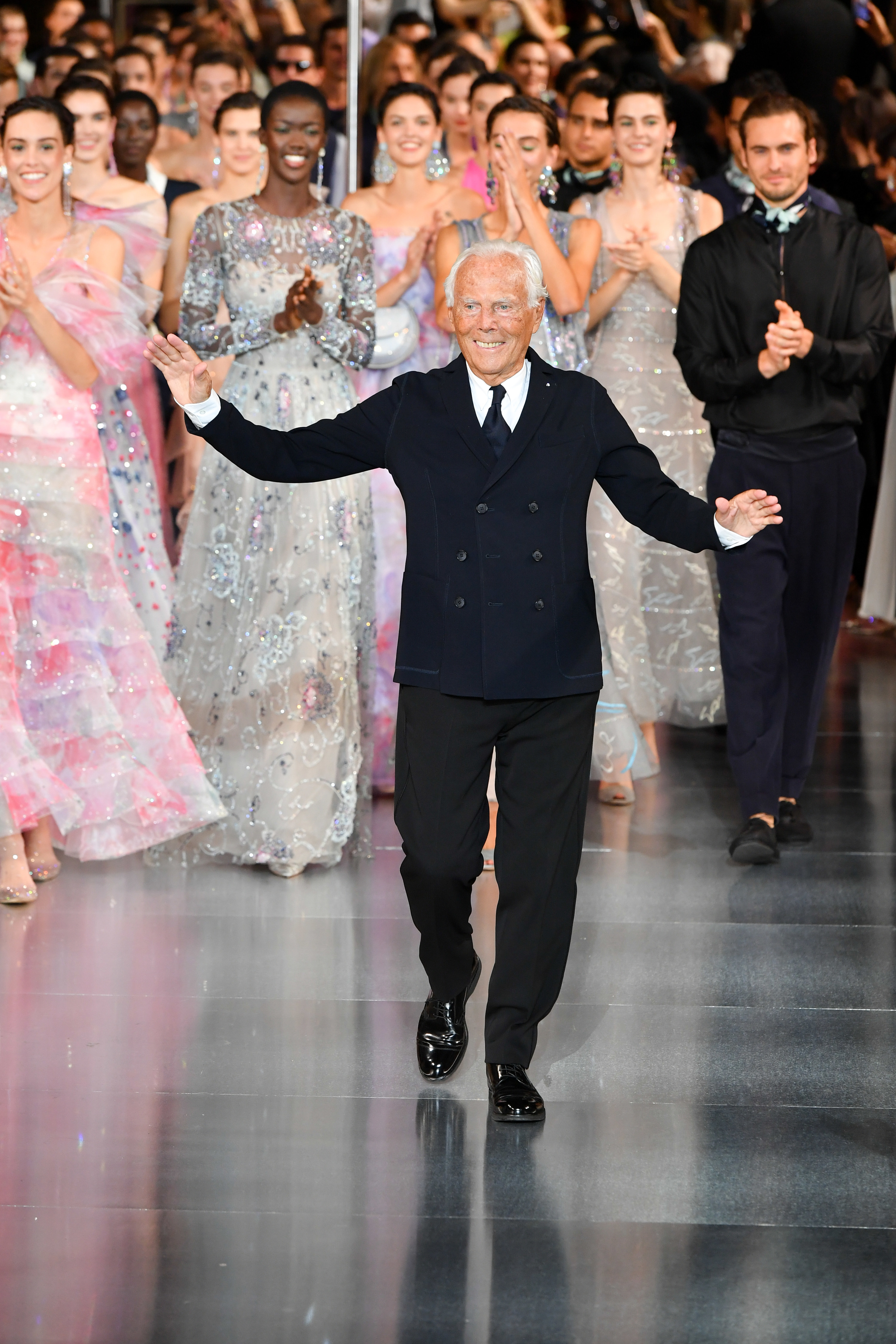 Armani walking at a fashion show