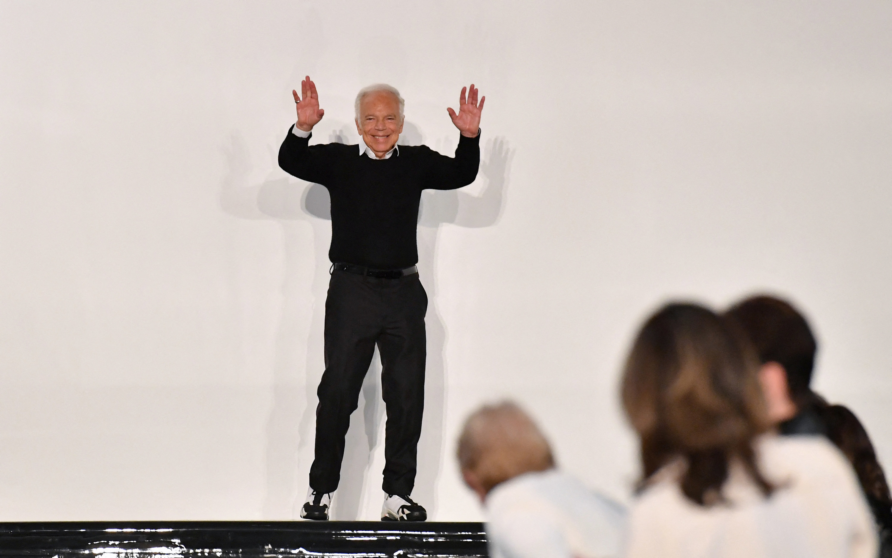 Ralph waving at the fashion show crowd