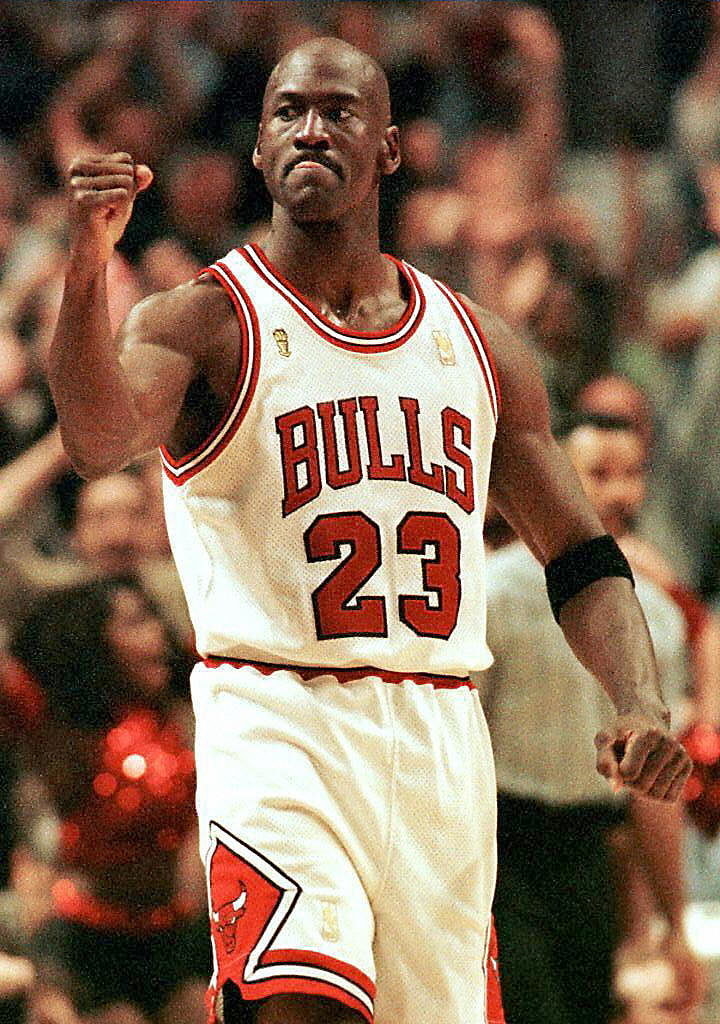 Michael playing basketball for the chicago bulls