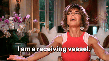 a gif of lisa rinna saying I am a receiving vessel