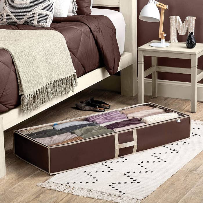 the storage bin sliding out from under the bed