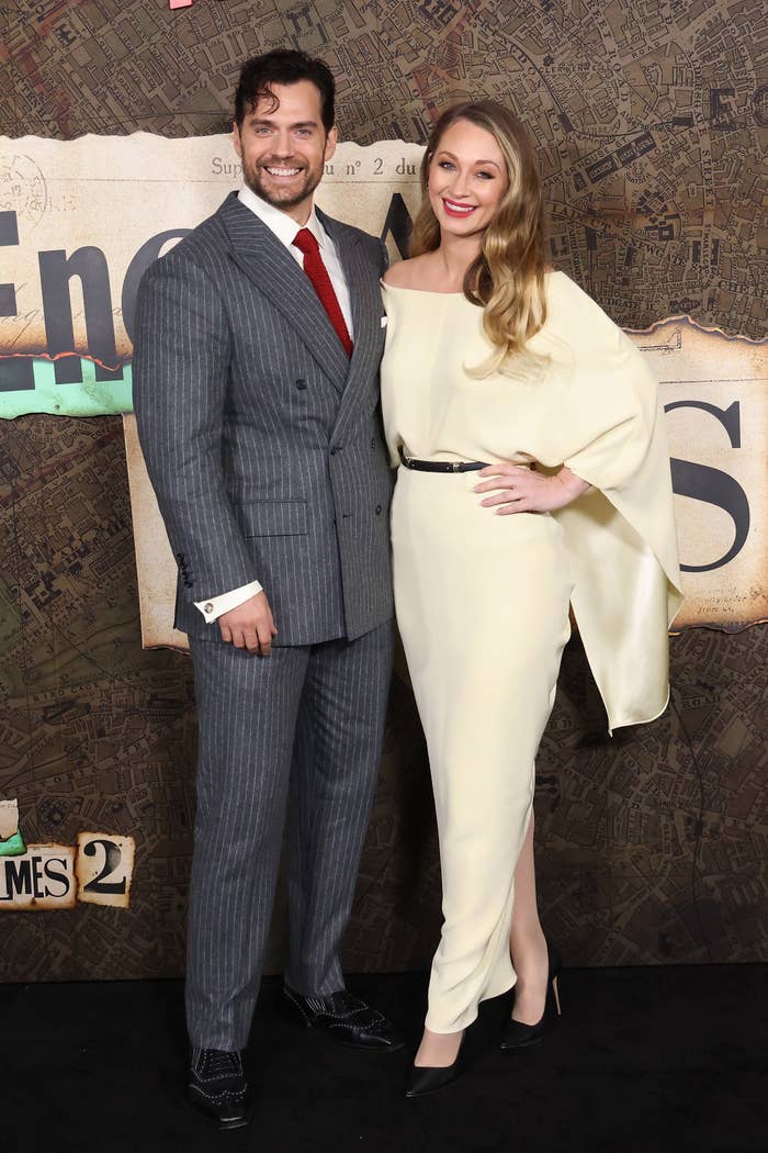 Henry and Natalie cozy up together on the carpet