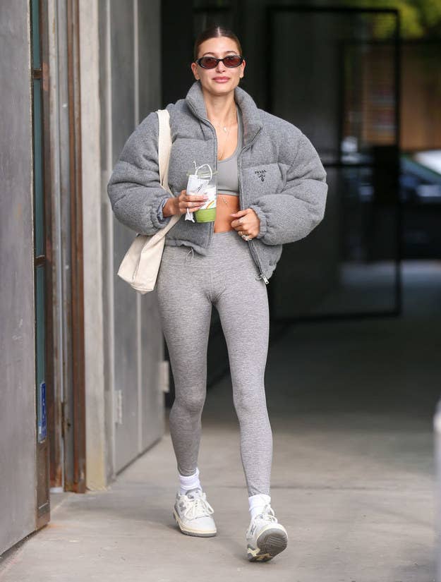 Hailey Bieber flaunts her street style in leggings and crewneck sweater