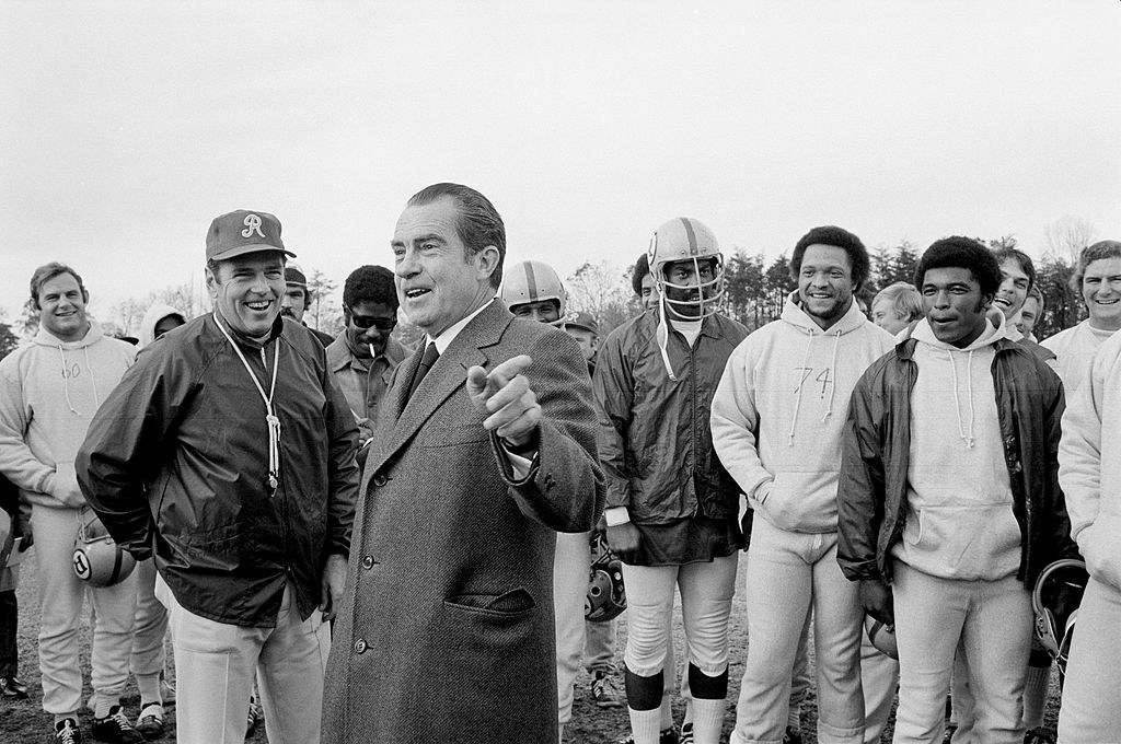 Nixon with a football team