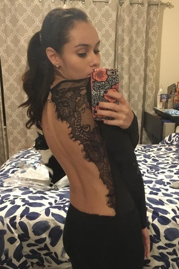 another reviewer showing the side view of the black bodysuit
