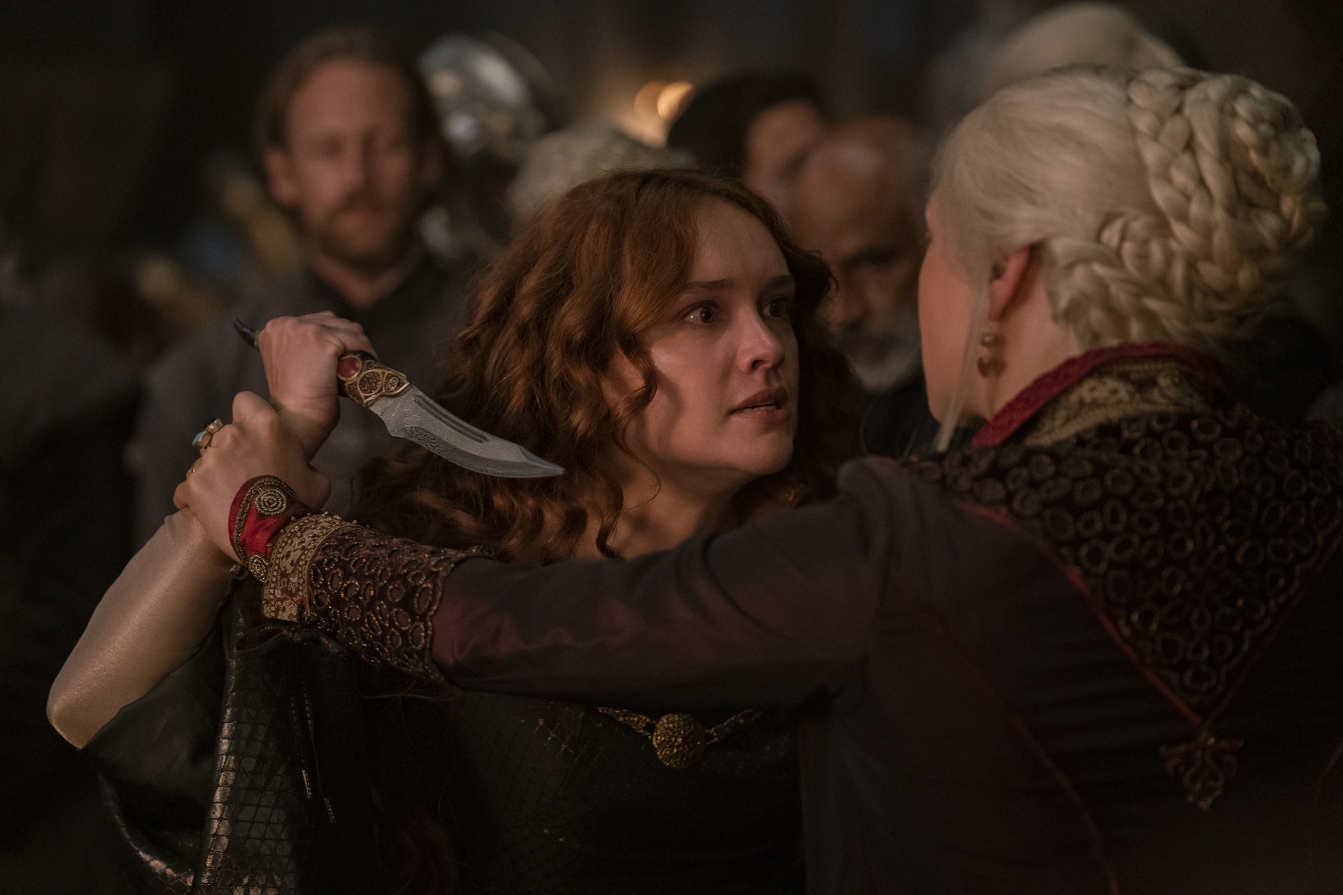 Alicent holds a dagger while Rhaenyra restrains her