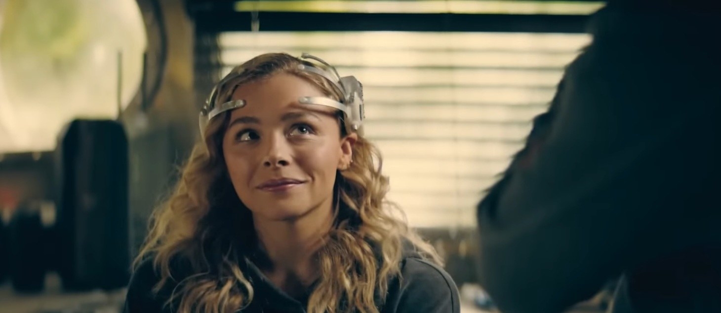 A young woman prepares to use an augmented reality headset in &quot;The Peripheral&quot;