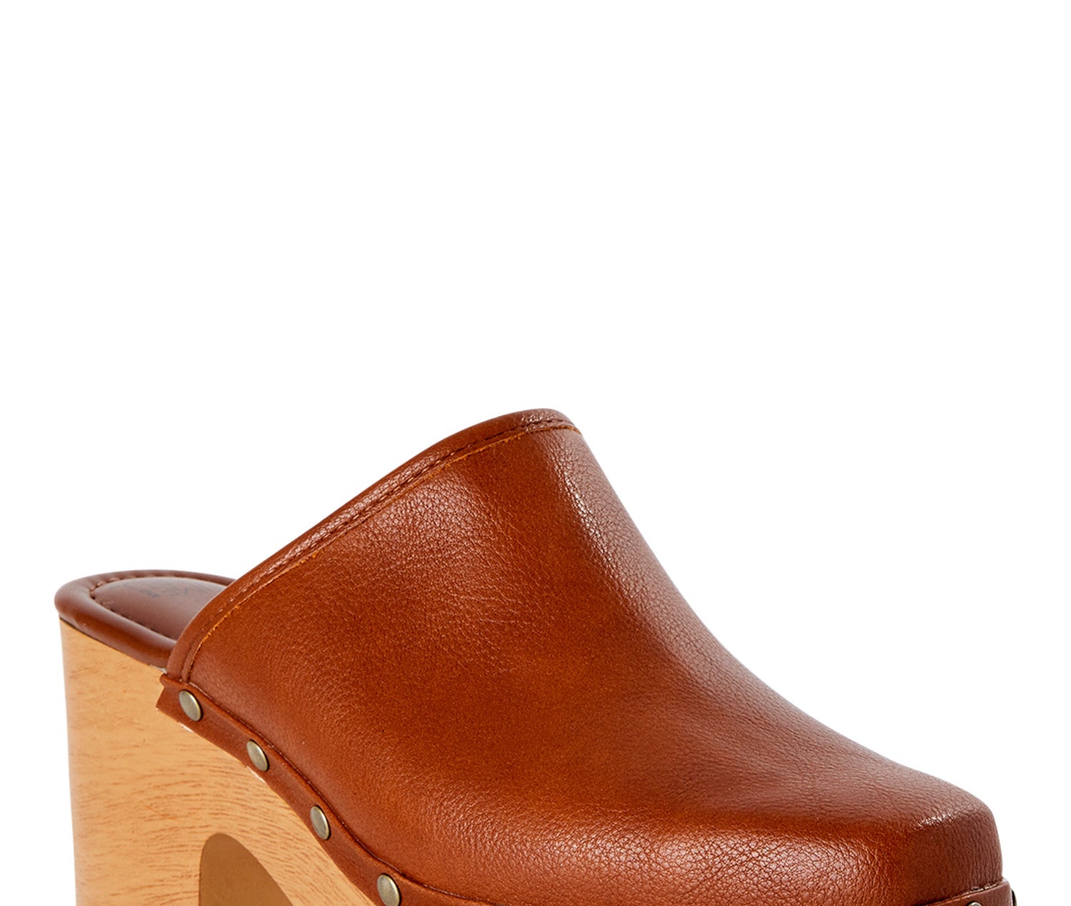 A brown leather shoe with wood