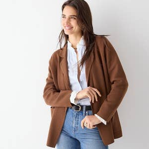 model wearing sweater blazer in brown with jeans