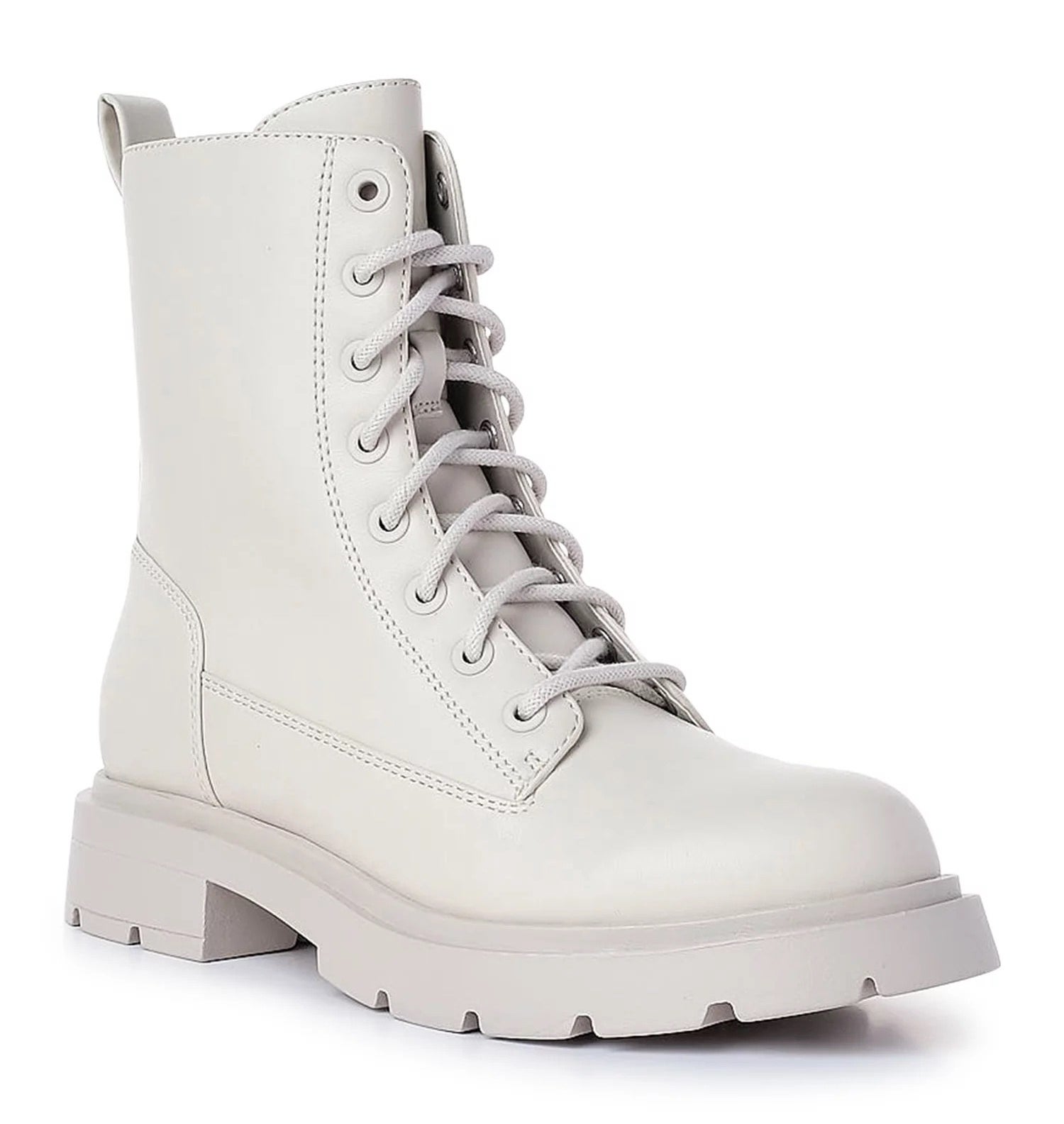 A pair of white combat boots