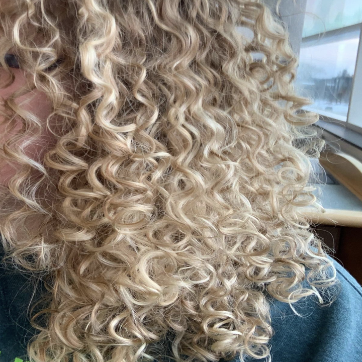 reviewer with 3b curls after using hair brush