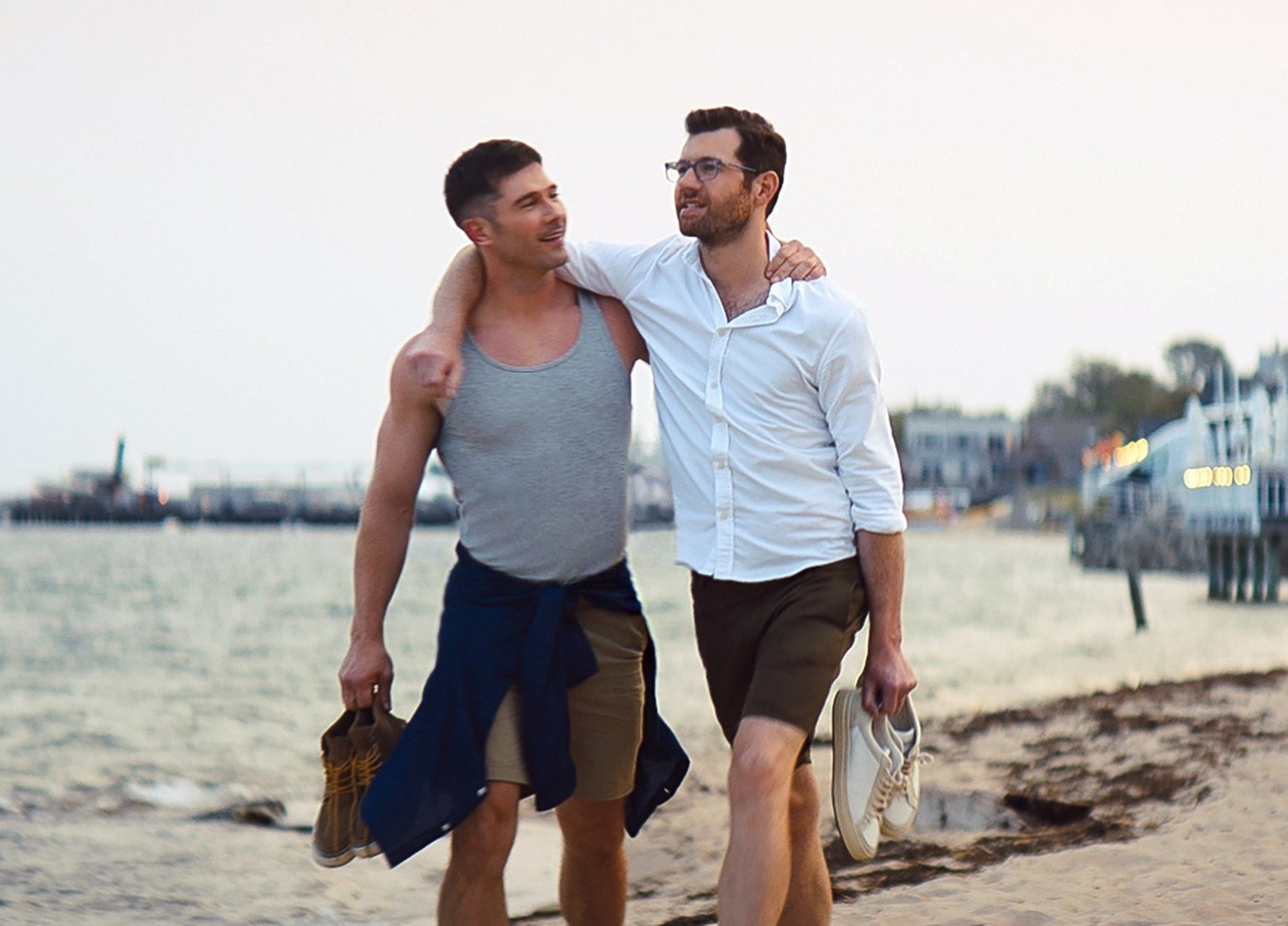 A screenshot from the movie of a couple walking on a beach together