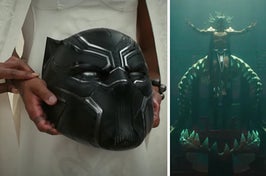 A woman holds the black panther helmet and a man rises from the water