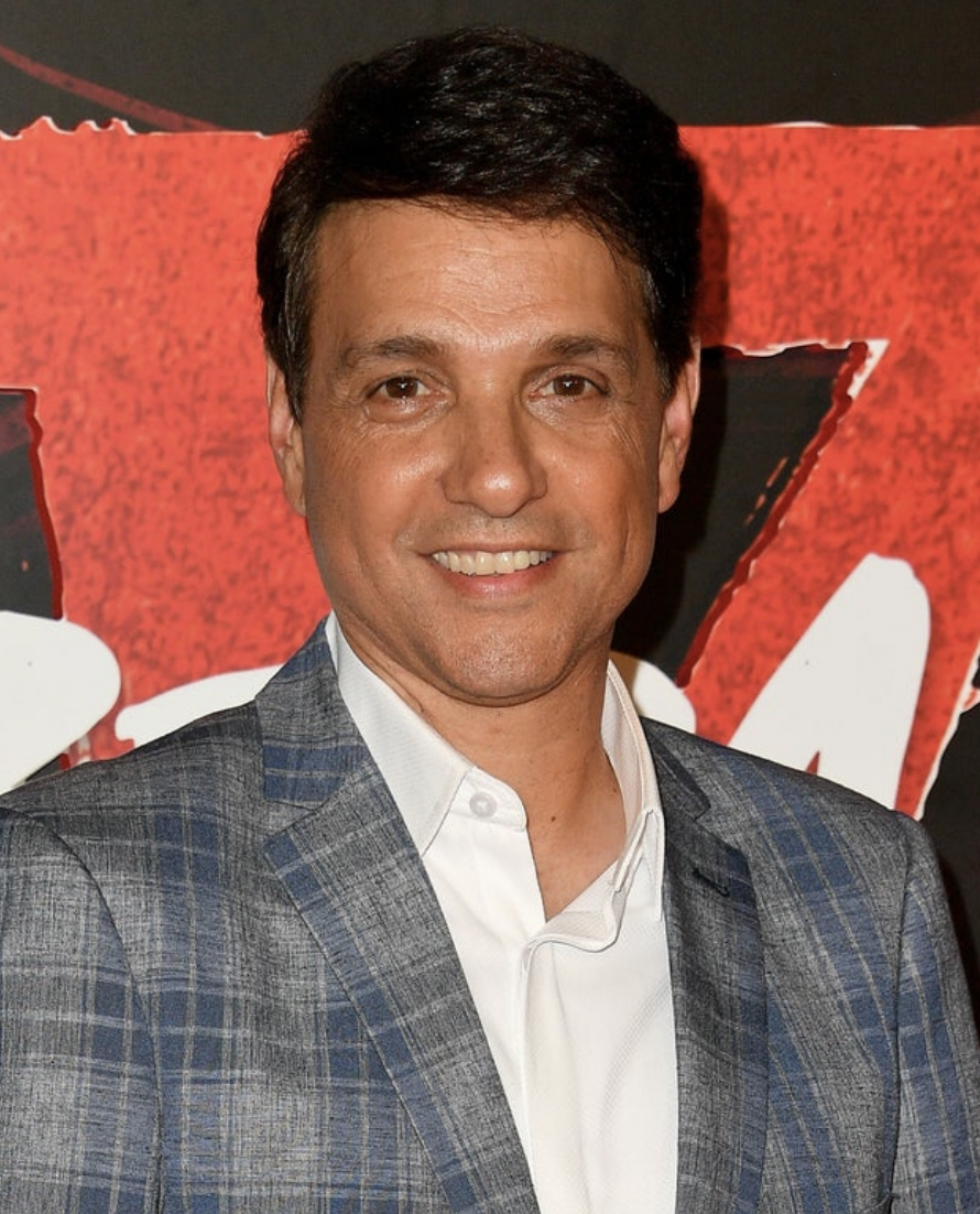 Ralph Macchio in a plaid suit on a red carpet