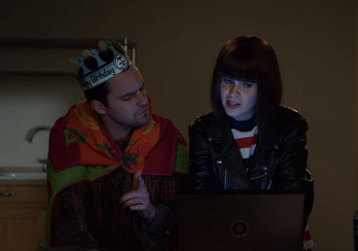 Nick and Jess from &quot;New Girl&quot; sit in front of a laptop